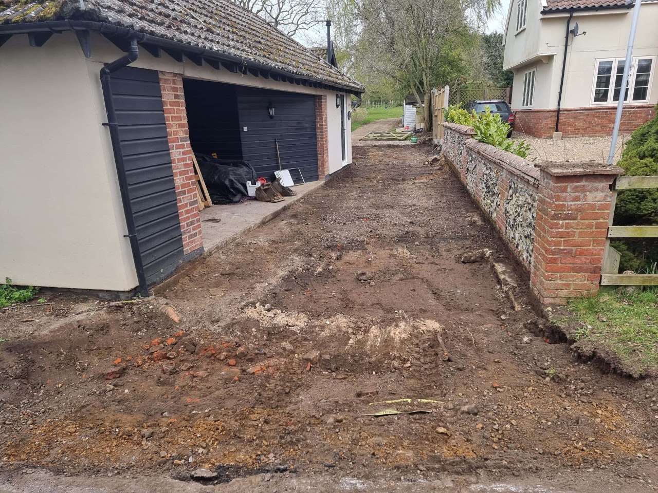 This is a tarmac driveway that is in the process of being dug out and installed by NS Driveways Redhill